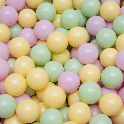 Spring pastel foam balls in pink, yellow, green and cream colors