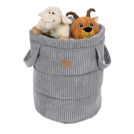 Grey corduroy storage basket filled with stuffed animals and toys
