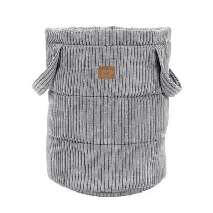 Empty grey corduroy toy storage basket with rope handles and ribbed texture